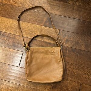 Innue leather handbag purse with top handle and shoulder strap